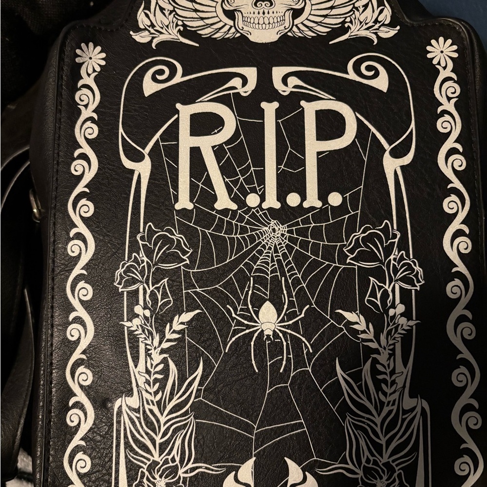 Glow in the dark tombstone backpack